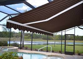 Our Beautiful Retractable Awnings Are A Great Addition To Any Home This Is Our Rolling Shade Awning Homedecor Pool Shade Impact Windows Hurricane Shutters