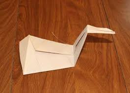 Get a square piece of paper, turn it over so that the colored side is at the bottom. Learn How To Make An Origami Paper Folded Swan Needlepointers Com