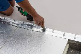 Amdrain exterior insulation panel with a vertical drainage system; Thermal Insulation