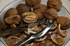After you remove the hulls, place the nuts, still in their shells, in a bucket of water. How To Crack And Shell Walnuts 7 Ways To Open Raw Nuts Delishably