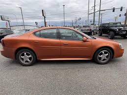 Image result for Sunburst Orange 2004 Pontiac