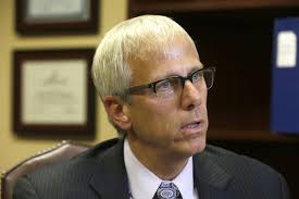 ECMC settles with former CEO Cleland for $1.2 million