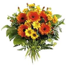 The fragrance of a flower can make you spellbound, mesmerized and hypnotized. International Flower Delivery Orange And Yellow Flowers Bouquet