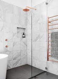 In this case, the wall is a canvas for the design of your dreams. 50 Beautiful Bathroom Tile Ideas Small Bathroom Ensuite Floor Tile Designs