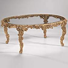 After all, an antique isn't just another piece of furniture; Carved Oval Coffee Table Oval Coffe Table In Antique Glass Finish