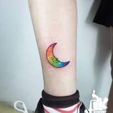 Rainbows often appear as the sun breaks through rain and cloud once a storm passes. 45 Rainbow Tattoos For The Colourful You