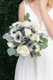 Guest book table with bohemian flower arrangement. Diy Wedding Flowers Boho Babe Bohemian Wedding Bouquets Kukka Flowers