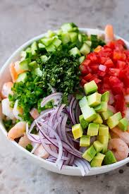 Shrimp marinated in lime and orange juice with red onions, tomato and cilantro. Shrimp Ceviche Dinner At The Zoo