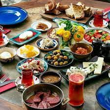 Spread feta cheese on the bread and top with jam. Turkish Breakfast Home Facebook