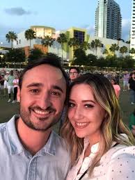 Can someone remove a person from this photo?