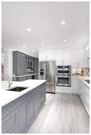 Grey white kitchen design13+ tips for making a good grey and white kitchen even better ideas, air to see how to mediumsized kitchen cabinets. Modern White Gray Kitchen Bright Modern Gray White Kitchen Gray Cabinets White Cabinets Grey Kitchen Floor White Kitchen Design Grey Kitchen Designs