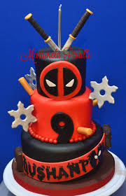 Original Design Of Deadpool Themed Cake With Swords Bullets And Ninja Stars Made From Gum Paste Deadpool Cake Themed Cakes Ninja Cake