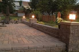 Retaining Wall With Slightly Raised Columns With Lighting Patio Landscaping Patio Patio Makeover