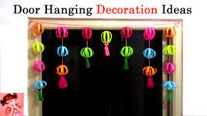 All you need is some fabric that can withstand the outdoor environment, yarn, and ribbon. Door Hanging Decoration Ideas Paper Ball Hanging Diy Door Wall Decor With Paper Youtube