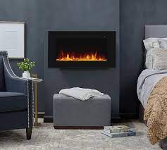 For a fireplace in your bedroom, you can usually choose either a traditional or ventless one. Real Flame Corretto Electric Fireplace Pottery Barn
