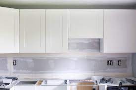 The old kitchen cabinets were pretty badly warped, and the whole space just felt dark. How To Design And Install Ikea Sektion Kitchen Cabinets Abby Lawson