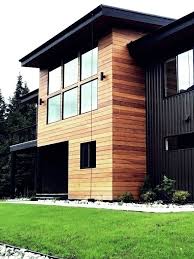Home cedar exterior with board and batten. 65 Stunning Cedar Siding Ideas Board And Batten Siding Blog Modern Farmhouse Exterior Wood Siding Exterior Exterior House Siding