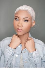 Keeping the hair longer so that the bangs are in the face is natural and a lot of fun. 16 Badass Black Women Slaying In Shaved Hairstyles Natural Hair Styles Shaved Hair Short Natural Hair Styles