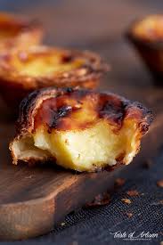 250 g soft butter, 1 cup sugar, 2 eggs, 1 tsp vanilla essence, 100 ml oil, 3 1/2 cups sifted plain flour, 4 1/2 tsp baking powder, 1 tin jam of choice (290g), 1/2 cup desiccated coconut, icing sugar for dusting. Portuguese Custard Tarts Taste Of Artisan
