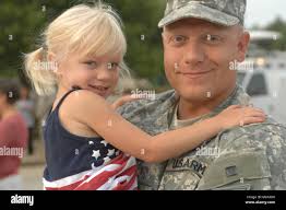 Sailor hugs daughter hi-res stock photography and images
