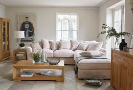 .right corner sofa in blue velvet and wooden legs •finish: Choosing The Right Sofa For Your Home By Oak Furniture Land The Oak Furniture Land Blog