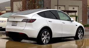 The 2020 tesla model y looks very similar to the compact model 3 sedan but can be outfitted with a third row of seats for a total seating capacity of. Tesla Model Y Performance Looks Just Like A Bloated Model 3 Carscoops
