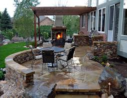 Building a small backyard patio with simple patio design ideas is much easier than you think. We Are Sharing 10 Flagstone Patio Designs That Moved Our Editorial Team With Their Inspiration Arti Outdoor Stone Fireplaces Patio Remodel Stone Patio Designs