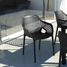 Mercury Row Juno Stacking Dining Arm Chair Modern Outdoor Dining Chairs Outdoor Dining Chairs Contemporary Outdoor Dining Chairs