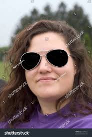 Smiling Teenage Girl Wearing Sunglasses Sitting Stock Photo 32370622