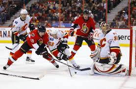 The ottawa senators face the calgary flames in an nhl regular season game at the scotiabank saddledome in calgary, alberta, canada what : Matt Stajan Jay Bouwmeester Jesse Winchester Mark Giordano Henrik Karlsson Jesse Winchester And Henrik Karlsson Photos Zimbio