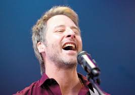 Popstar Chesney Hawkes performs at Windsor's 'One and Only' banking branch 