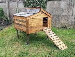 Have A Look At The Chicken Coop Which Is Simple In Looks But Will Make The Hens H Wood Pallet Furniture Diy Pallet Furniture Outdoor Pallet Projects Furniture