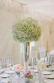 Baby S Breath Centerpiece In Tall Vases Baby S Breath On Tall Silver Vase Jodi Mille Cheap Wedding Flowers Wedding Centerpieces Flower Centerpieces Wedding