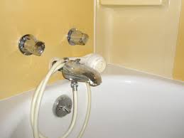 A shower drain requires a 2 drain per plumbing code, get the jackhammer out. How To Switch Out Wall Mounted And Handheld Showerheads Dengarden