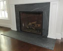 Black And White Fireplace Surround Fireplace Surrounds Make A Statement Without Saying A Word Fireplace Tile Surround Granite Fireplace Fireplace Tile
