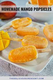 Mango Popsicles With Creamy Filling In 2021 Mango Popsicles Snack Recipes Dessert Recipes