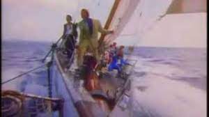 The man reading a newspaper is her father. Dd Rio Youtube