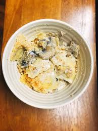 Homemade Mozzarella Filled Ravioli Gratin With Mushrooms Food Recipes Food Recipes Mushroom Recipes