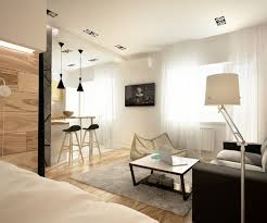 A new personal gaming area has been set up in the corner with triple screens and a comfortable moving chair. An Interior For A Young Couple By Design Art Ugol
