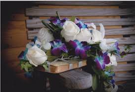 Jess Used Her Grandmother S Bible As The Base For Her Bouquet Of White Roses And Blue Orchids Wedding Flowers Bridal Bouquet Blue Orchids
