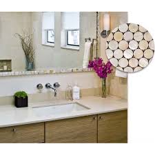 Whether you cut mirror tiles yourself or use a glass supplier, you'll need to prep the surface before installing the mirrors. Penny Round Mother Of Pearl Kitchen Backsplash
