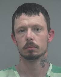 Three others arrested during execution of warrant for shooting suspect