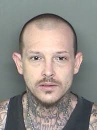 Suspicious Vehicle in a Parking Lot Leads to Drug Charges and Loaded  Handgun Arrest