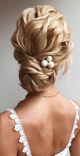 This is a classic bubble ponytail without the bubbles, and it's a great updo option for fine hair at medium to long lengths. Chic Updo Hairstyles For Modern Classic Looks
