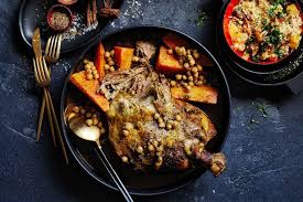 Moroccan lamb and couscous slow cooker. Slow Roasted Lamb Shoulder With Orange And Date Couscous Recipes Delicious Com Au