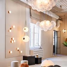 A Constellation Of Apparatus Lighting Including Two Signature Cloud Pendants Punctuates The Brand S New Show Cloud Lights Novelty Lighting Apparatus Lighting
