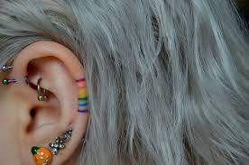 Pin By Cheryl Marez On Tattoos Rainbow Tattoos Ear Tattoo Body Art Tattoos
