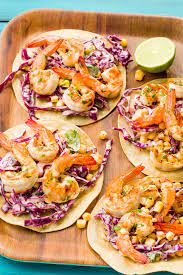 Tender and flaky fish full of spicy flavor tucked into flour tortillas and topped with garlic cilantro lime slaw. 15 Easy Fish Taco Recipes How To Make Fish Tacos Delish Com