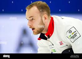 Norwegian skip Magnus Ramsfjell calls sweep while taking