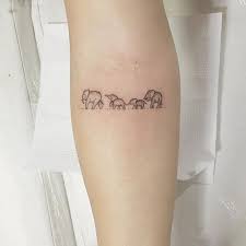 30 Tiny Tattoo Ideas For Major Inspiration Tattoos Elephant Family Tattoo Family Tattoos